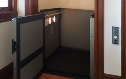 Genesis shaftway model vertical platform lift for wheelchairs built under and doorless archway