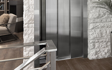 Home elevator with 3 speed hall doors open halfway