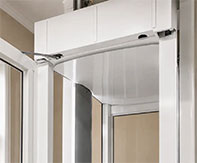 LUMA Homelift installed between two rooms in a modern open-concept home, emphasizing seamless integration